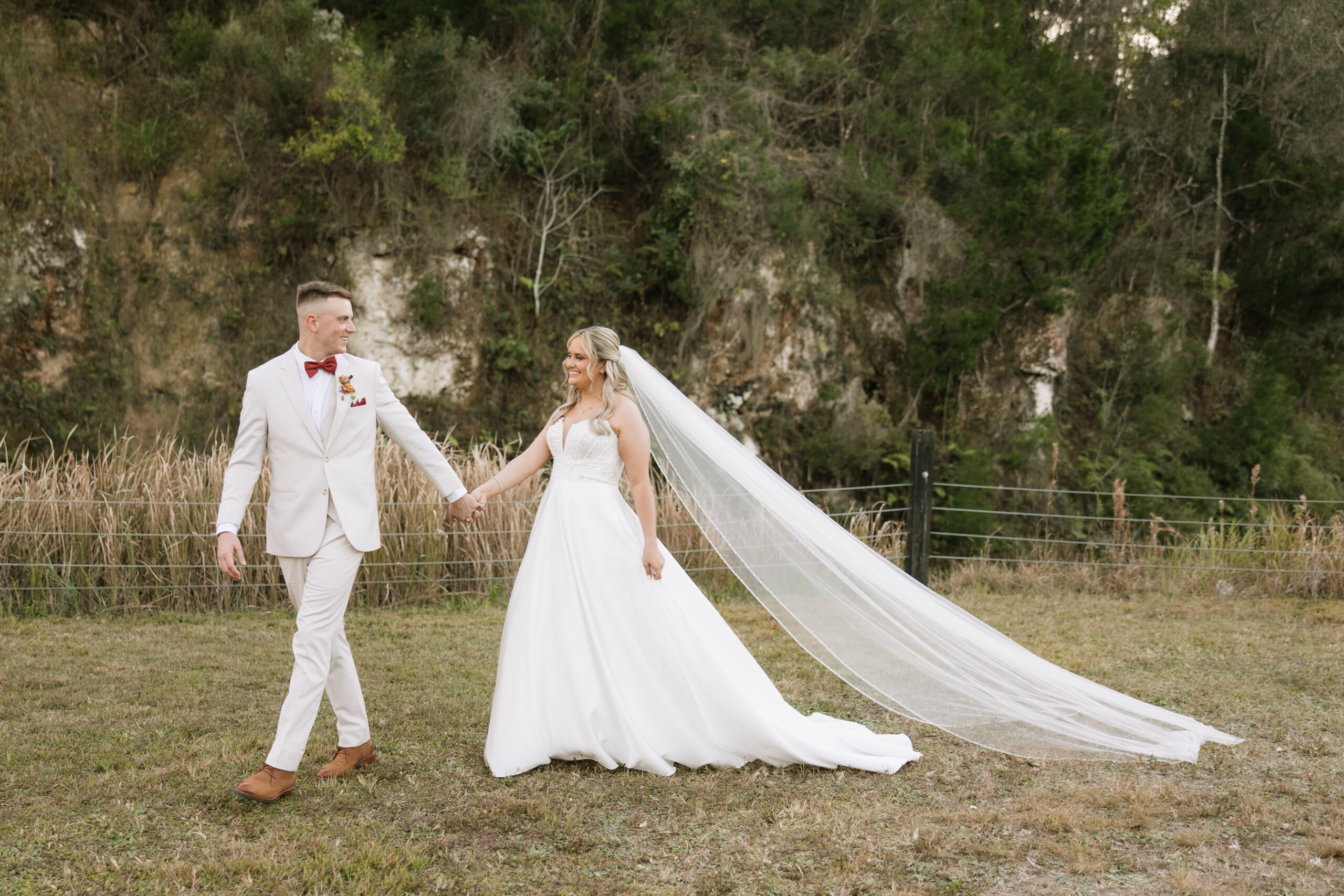 bride and groom walking at white rock canyon
